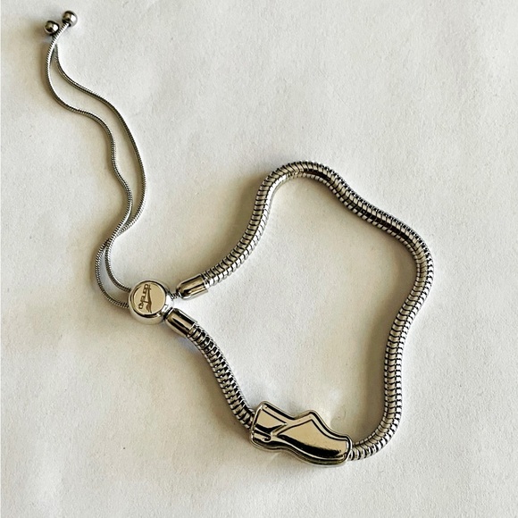 Dansko Jewelry - NWOT Silver Dansko Collectible Adjustable Clog Bracelet with Bag